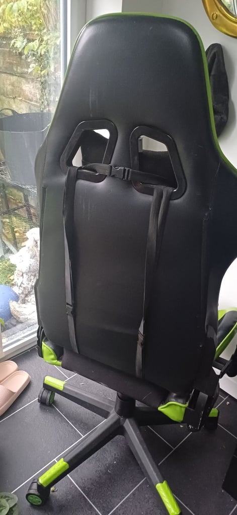 Black and green gaming chair.