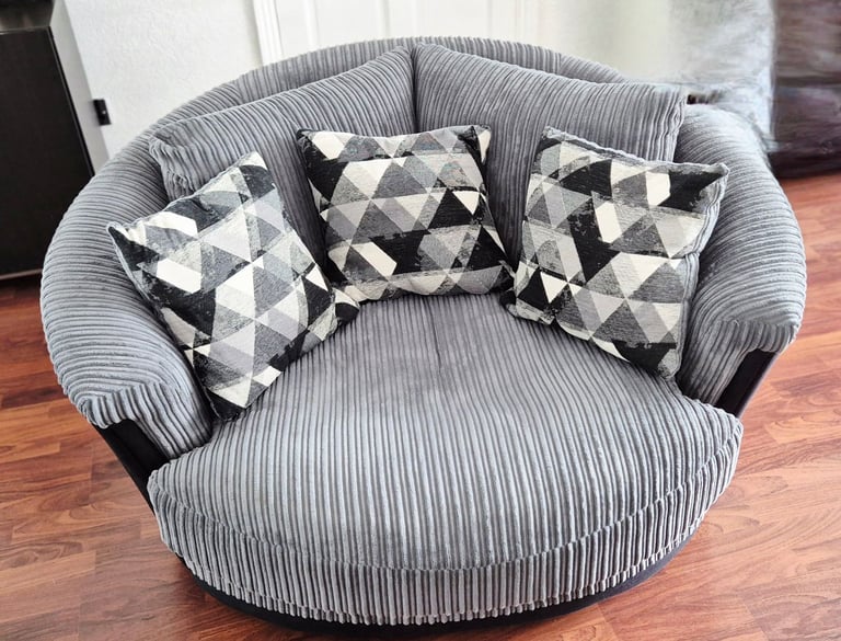 image for Swivel cuddle armchair/sofa Harveys