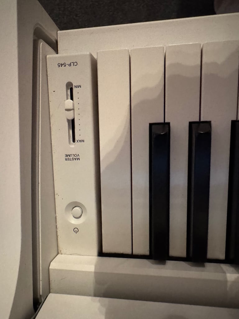 White wood Yamaha Clavinova digital piano 