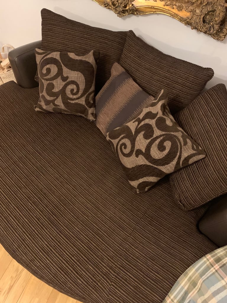 Large brown cuddler settee. DFS