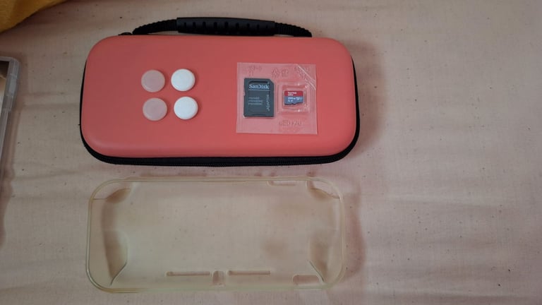 Nintendo switch lite coral pink 