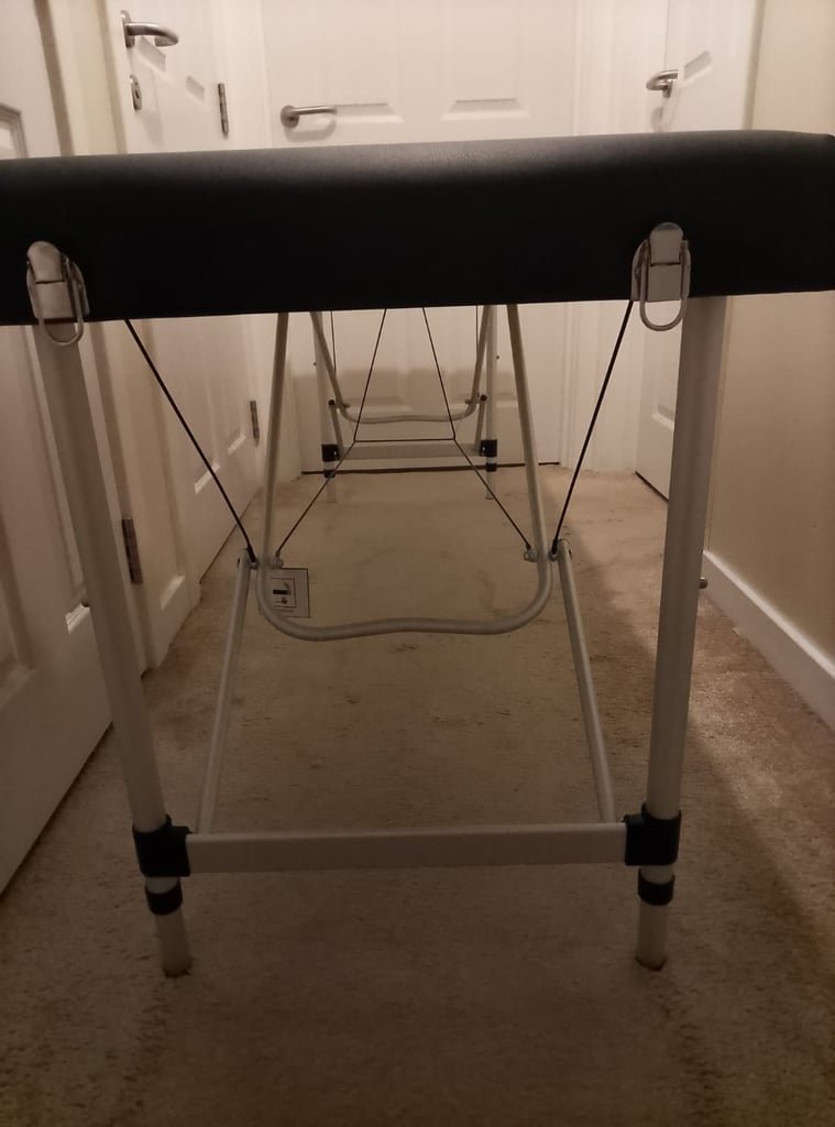 Massage table