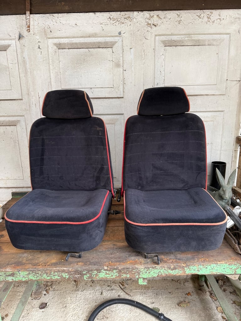 Pair of original jet black mini seats