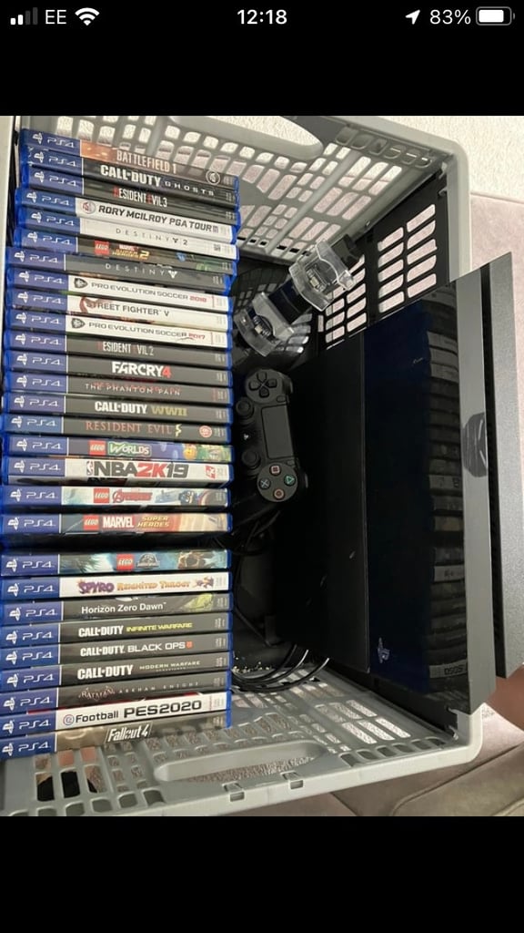 * REDUCED Sony PS4 Bundle with 28 games and controller