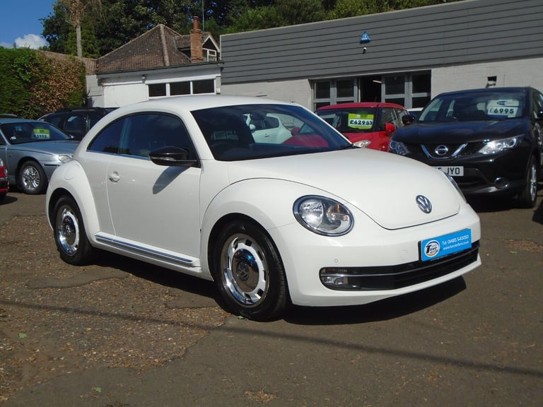 AUTOMATIC AUTOMATIC BEETLE JUICE SUPER LOOKING FACE LIFT FINISHED IN ICE WHITE..