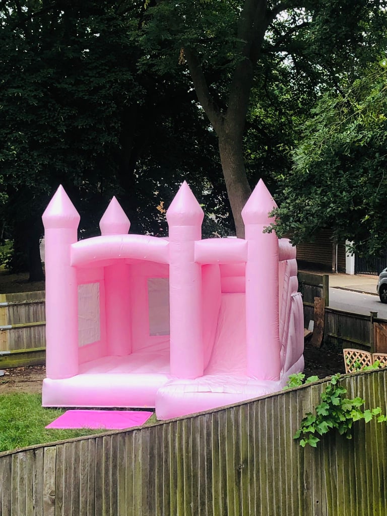 Pink pastel bouncy castle slide combo 