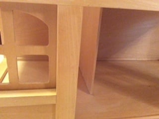 Wooden dolls house with furniture 