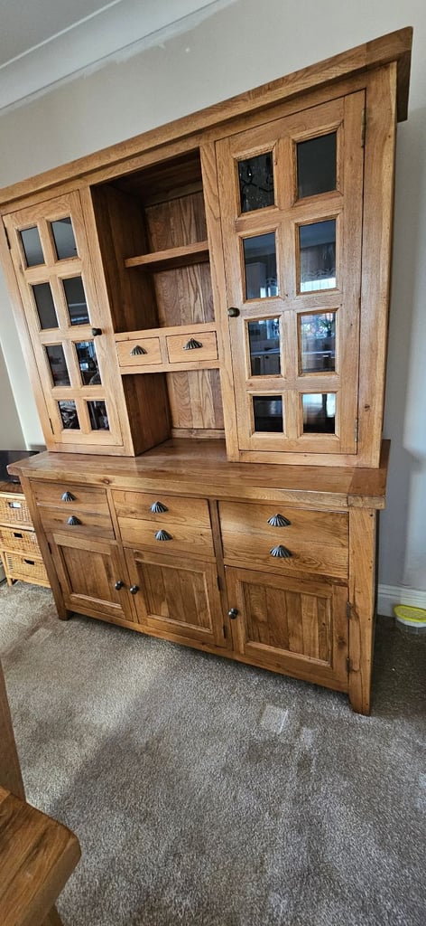 Oak dining table with six chairs and oak dresser
