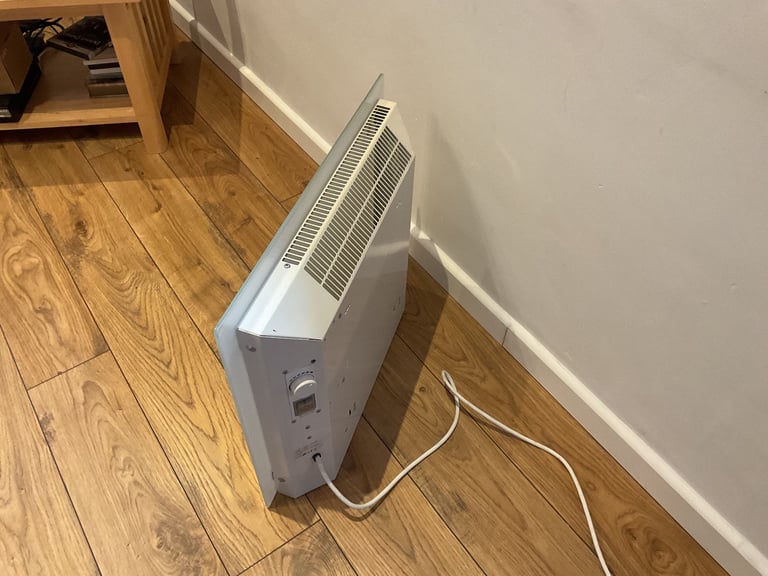 Wall Mounted Electric Heater with mounting bracket and service manual