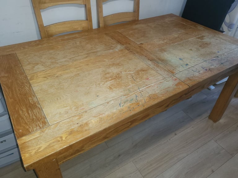 Large oak furniture land extending dining table 