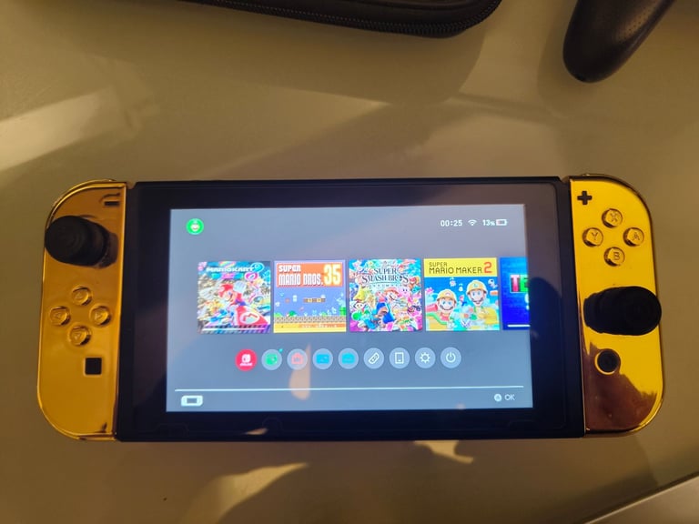 image for Nintendo Switch 32GB with Games and Pro Controller - Very Good Condition