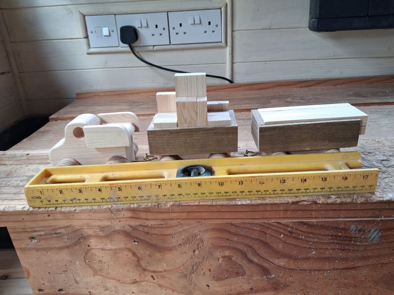 image for Wooden car with trailers.