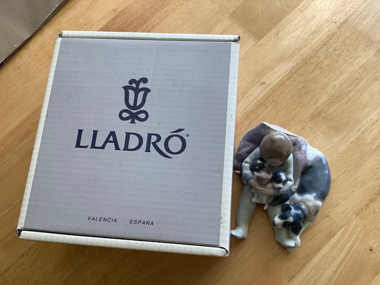 image for Lladro Boy with dogs