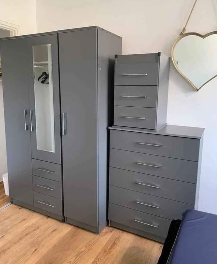 Modern Bedroom Furniture. Bedroom Suit Includes Bedside Tables, Chest of Drawers and Wardrobes
