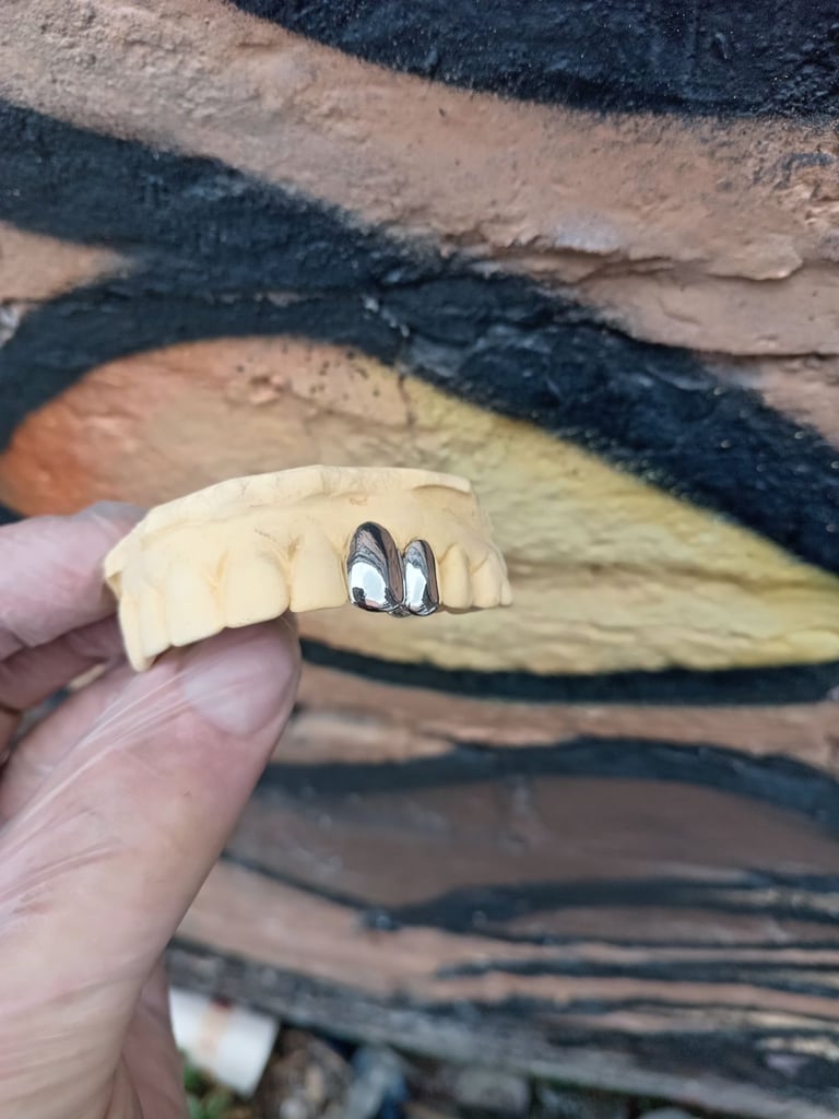 Custom made double cap silver grillz 