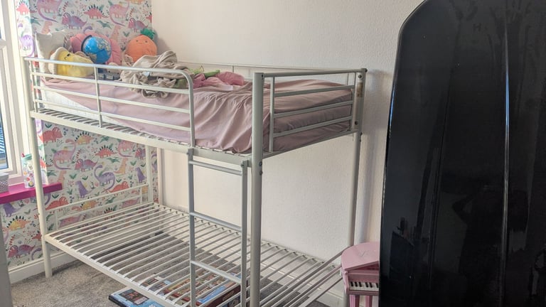 White metal single bunk beds