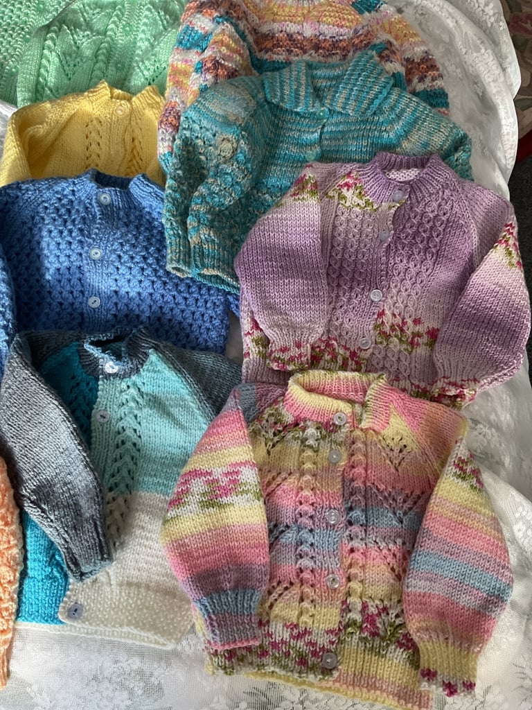 Baby cardigans/jackets etc, blankets and shawls, all hand knitted