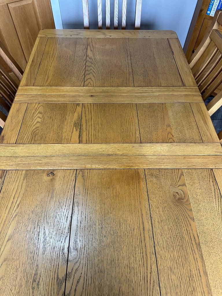 Extendable Oak Dining Table with 8 Chairs