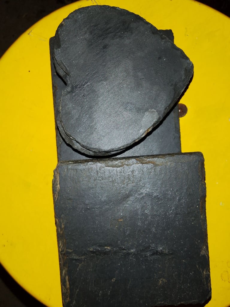 The Slate company coasters and candle stand