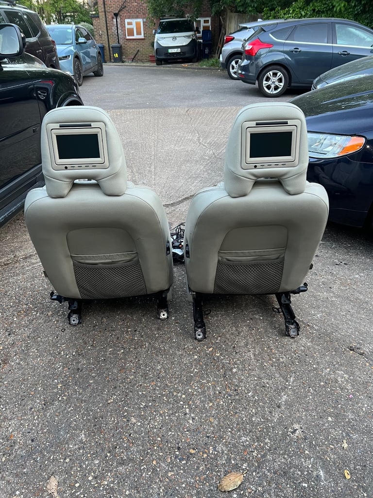 image for Volvo xc90 front seats with TVs and 10 cd changer 