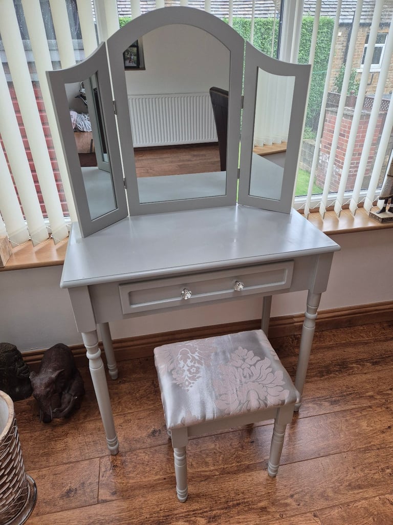dressing table, stool, and mirror set. 