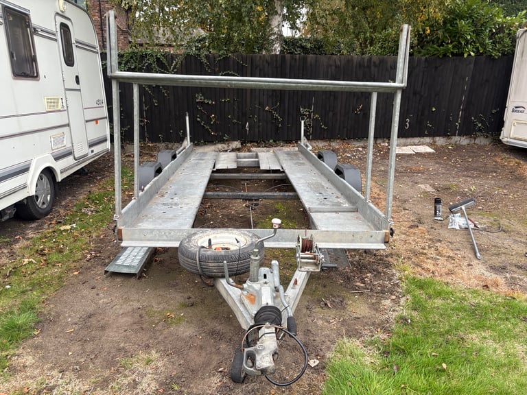 image for Brian James race track car transporter trailer with tire rack and spare wheel