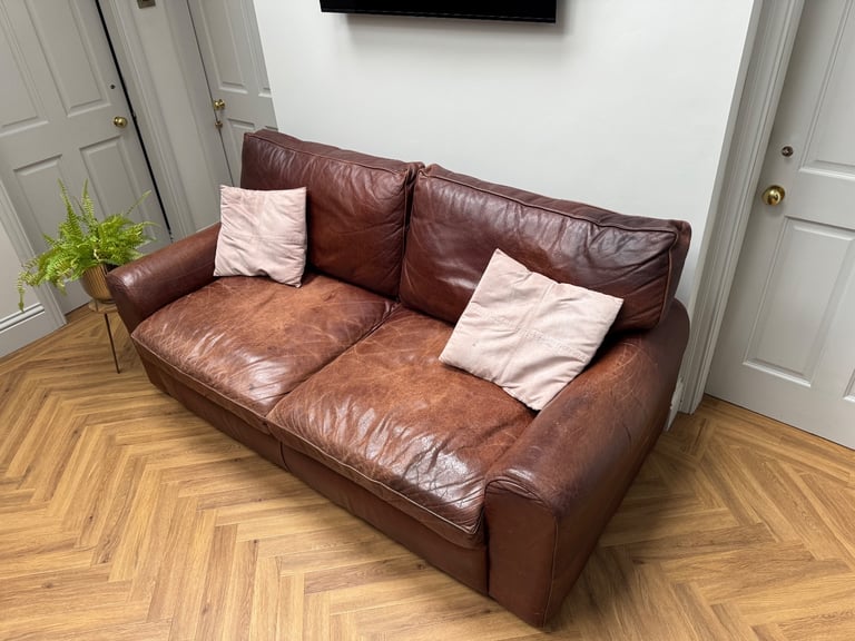 image for Free leather sofa