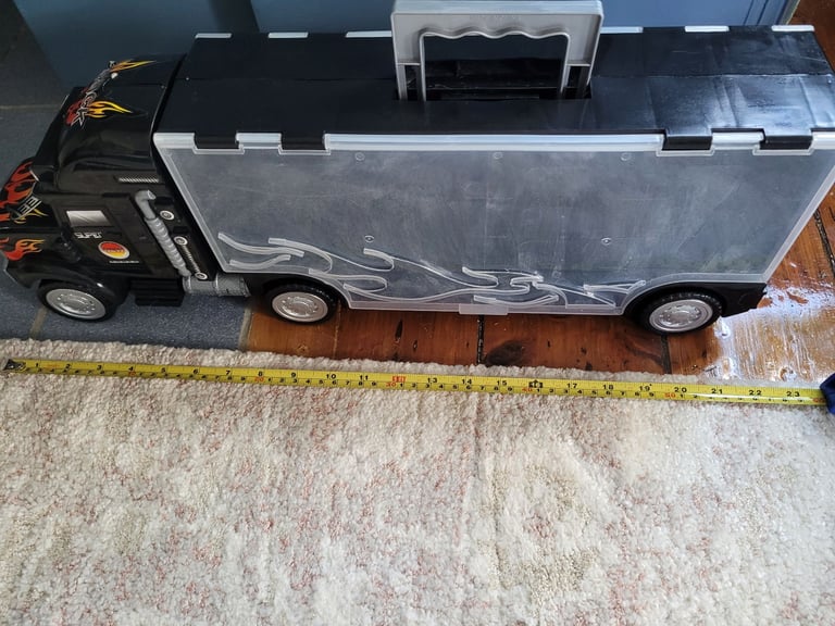 Black car transporter lorry