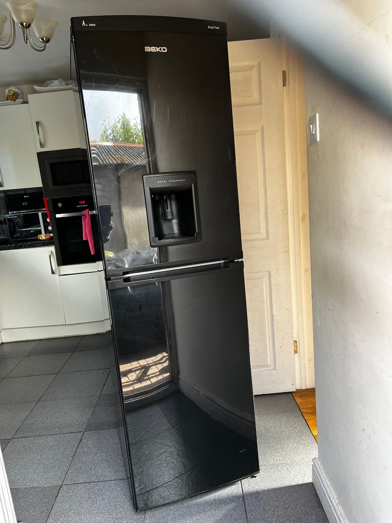 image for BLACK GOOSE FROST FREE BEKO FRIDGE FREEZER WITH DRINKS DISPENSER IN GOOD WORKING CONDITION