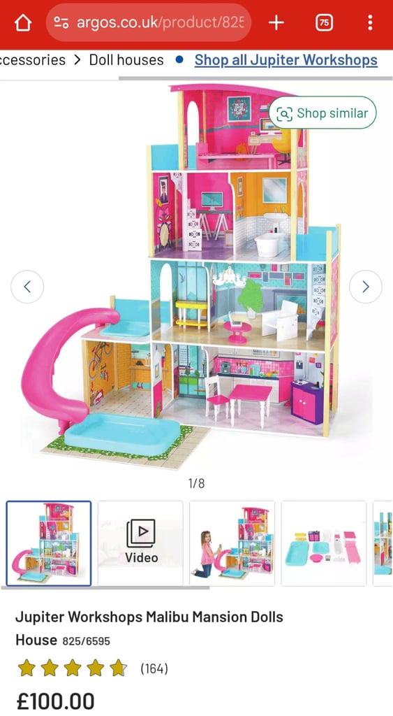 Brand new in box- Malibu mansion dolls house 