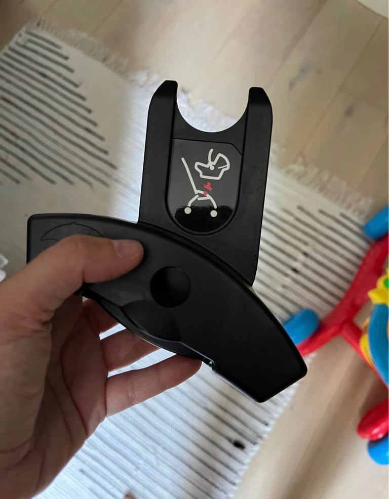 Maxi Cosy car seat with baby adaptor cushion and buggy adaptors
