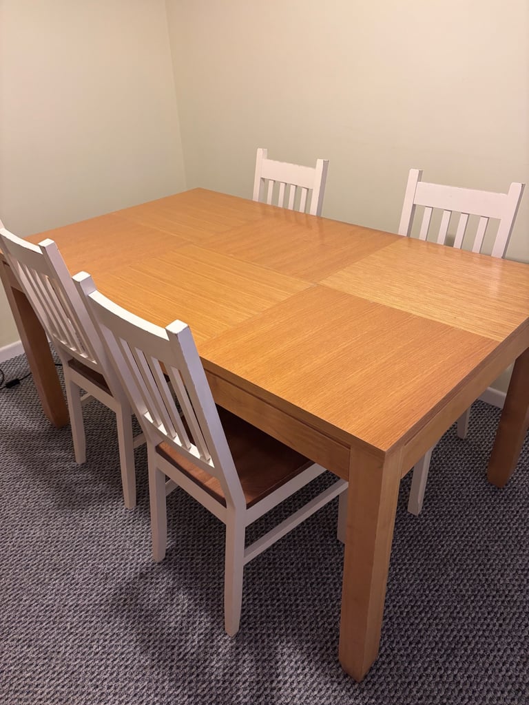 Dining room table and chairs with matching side board 