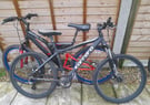 TWO double-disc brake bikes - spares or repair