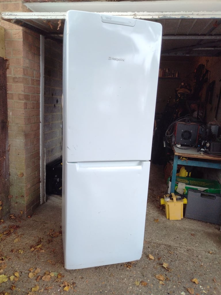 Hotpoint Fridge freezer 5ft x 9 inch high has couple of marks but all working can deliver local 