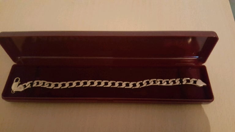 image for 9ct gold curb bracelet £725