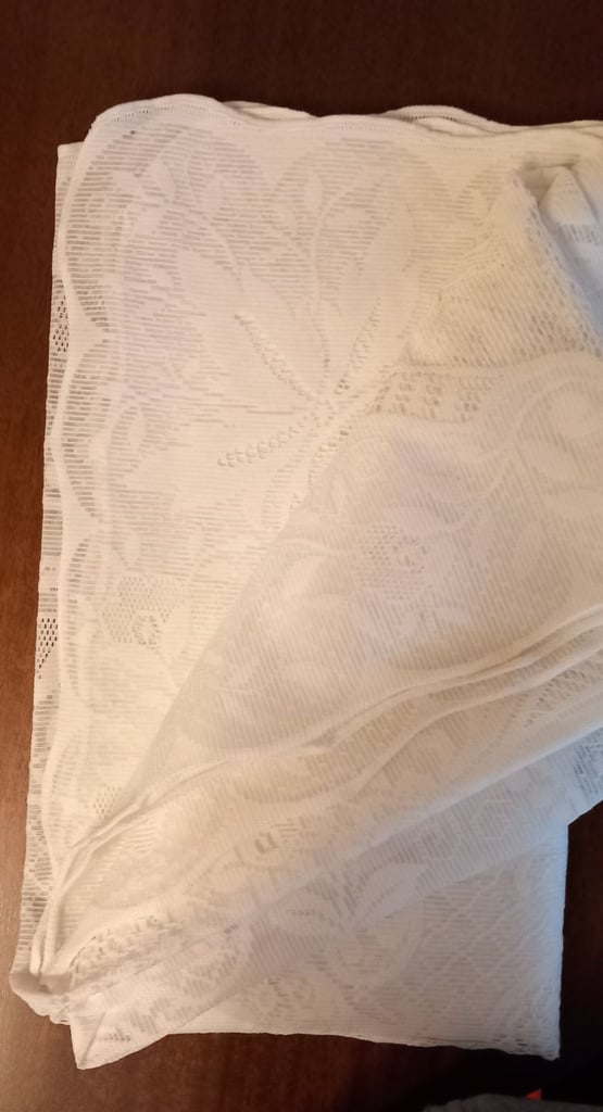 White Lace Tablecloth. 210cms x 175cms approx 