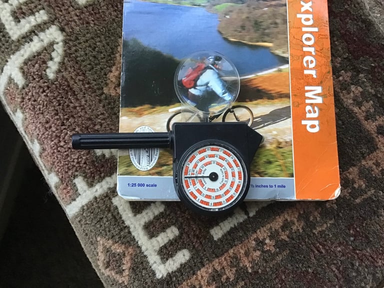 Silva map measure distance with magnifying glass