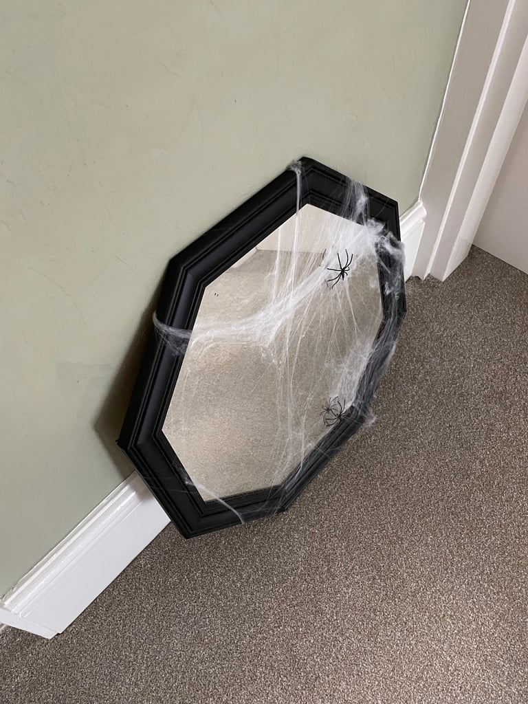 Black framed mirror. Halloween 