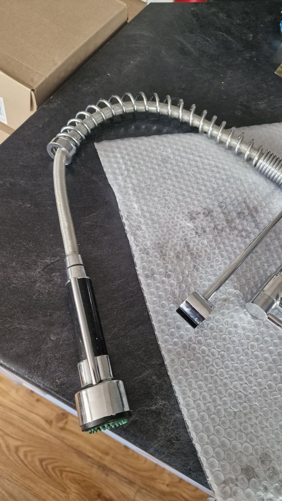 Large kitchen mixer tap with shower spray 