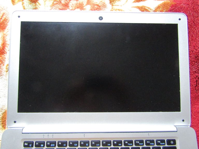 silver JOOMPER 14inch laptop tools in good condition lightly used 64GB own charger
