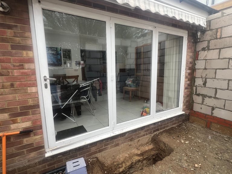 Home Renovation Deal Kitchen Drawers. Bi-folding door and a window  