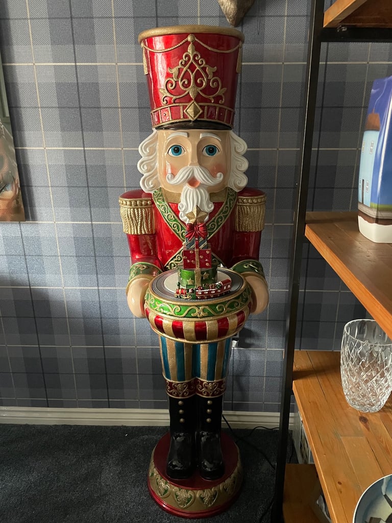 Large Christmas nutcracker 5ft tall lights up and plays music. Like new