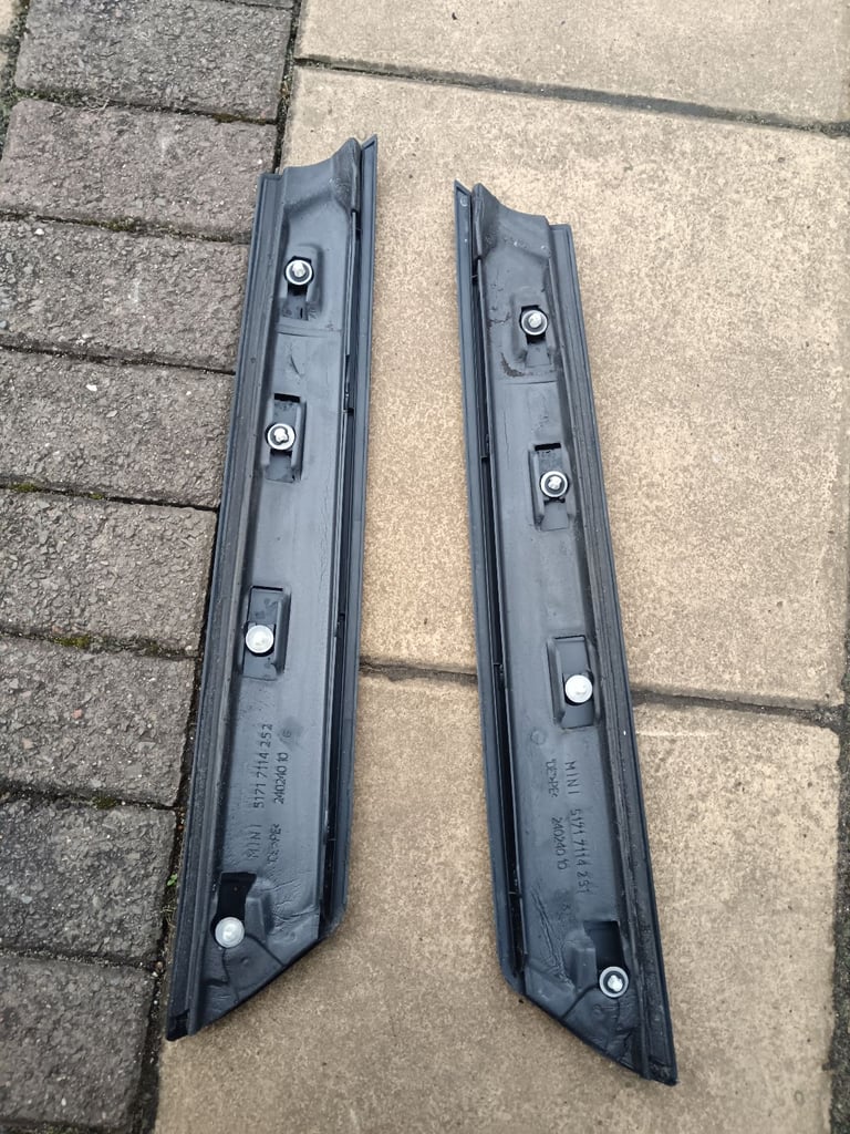 Mini R52 Apiller plastic trim. Drivers side has a bit missing where a screw attaches 
