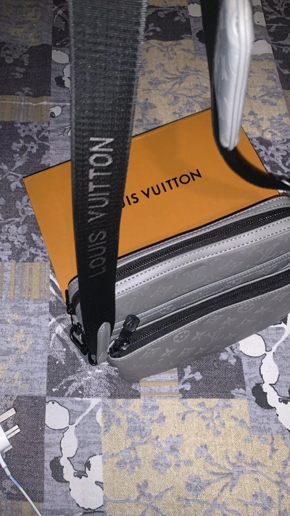 L V Messneger bag