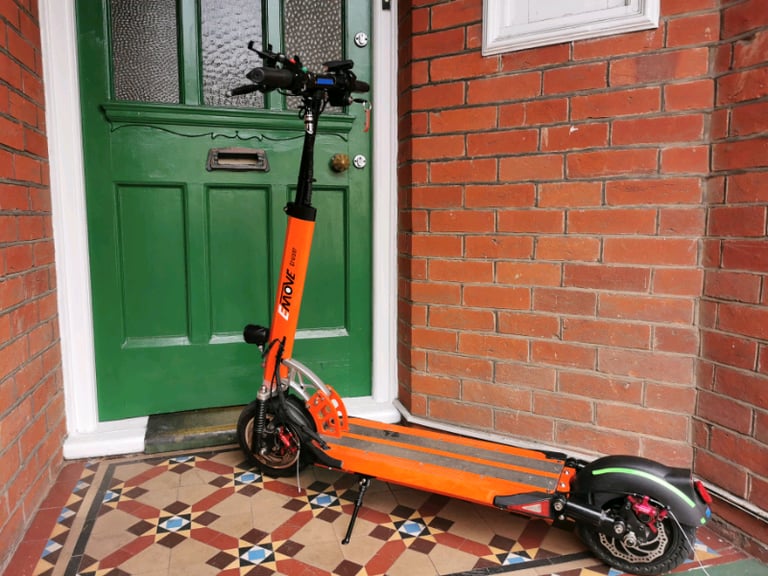 From USA an Orange electric scooter EMOVE Cruiser 'S' 52V 1600W Dual