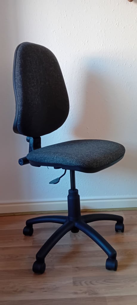 Black office chair with wheels. Great condition