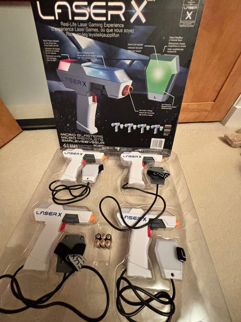 Laser X 4 Micro Blasters, 2 never used, excellent condition with box and batteries