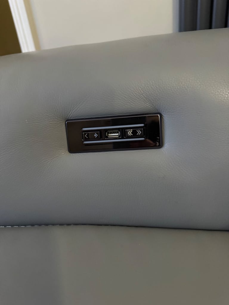 Corner sofa, light grey soft leather recliner & footstool, electrical adjustable head & leg rests