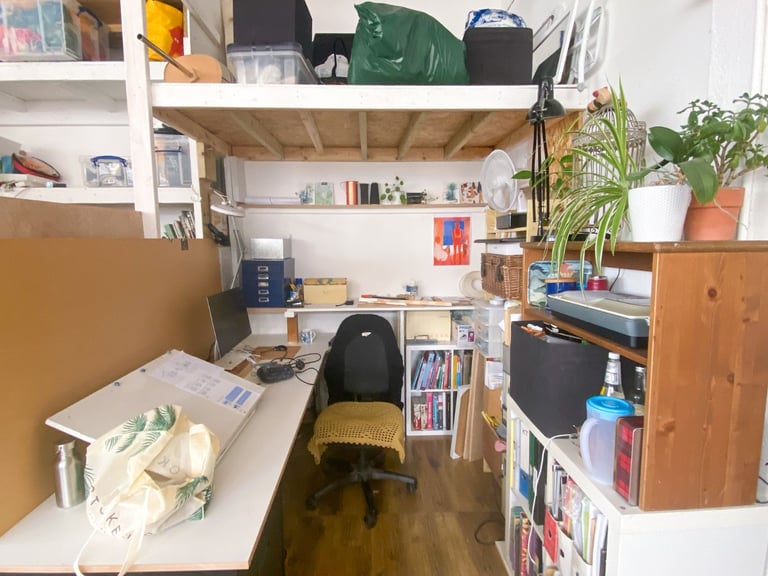 Deskspace in shared artist co-working space
