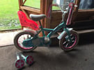 Child’s bike with doll basket
